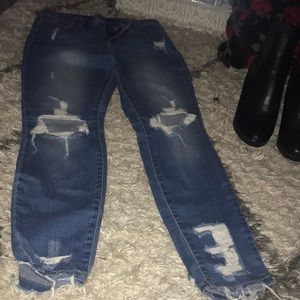 Medium wash distressed skinny jeans